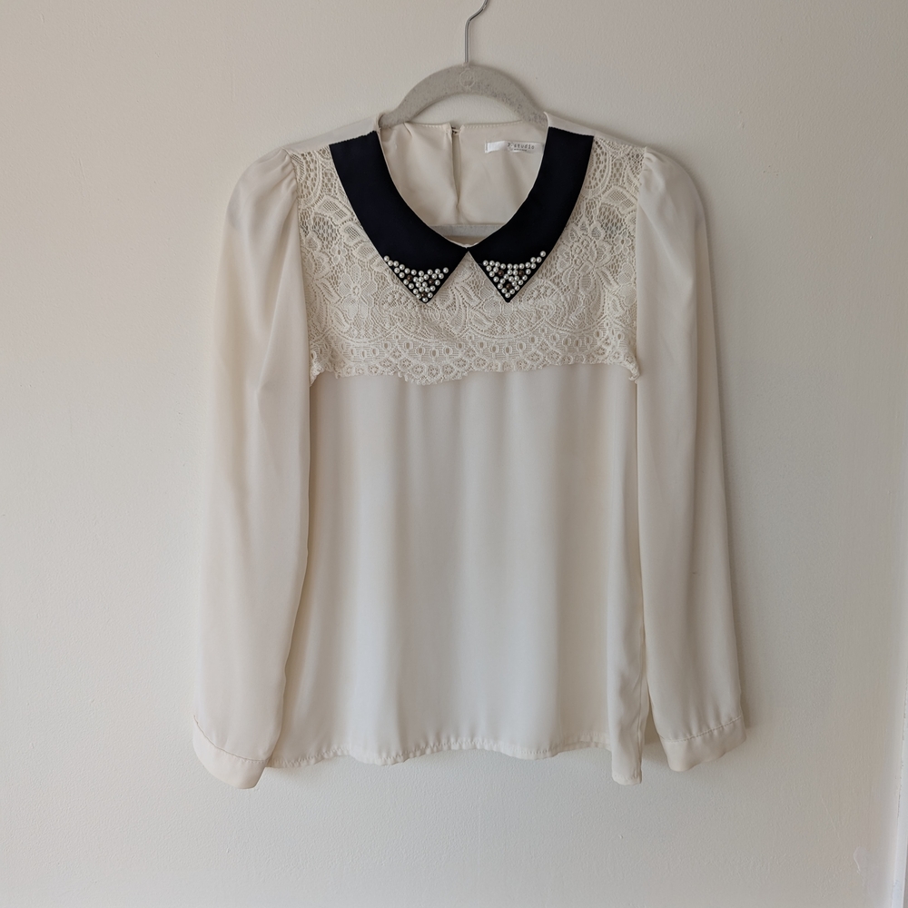 Elegant Cream Blouse with Black Collar